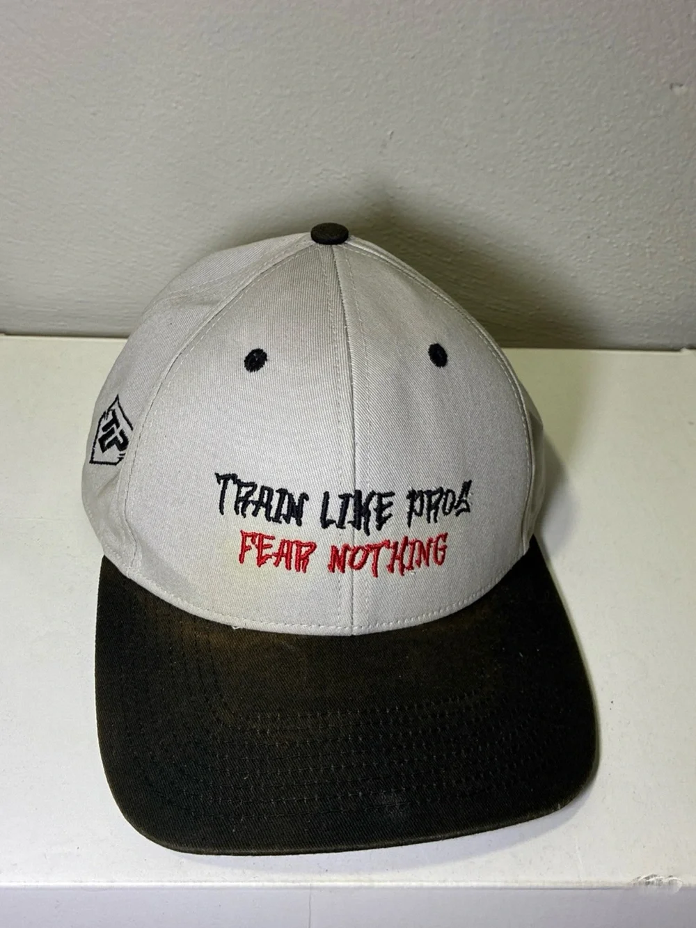 Two-Tone Black and‎ Cream Baseball Cap with Embroidered Slogan